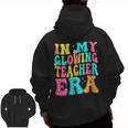 In My Glowing Teacher Era Groovy Colorful Bright Men Zip Up Hoodie Back Print, Groovy Teacher Gifts, trending gift In My Glowing Teacher Era Groovy Colorful Bright Men Zip Up Hoodie Back Print, Groovy Teacher Gifts, trending gift