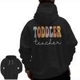 Toddler Teacher Retro Groovy Women Happy First Day Of School Men Zip Up Hoodie Back Print, Groovy Teacher Gifts, trending gift Toddler Teacher Retro Groovy Women Happy First Day Of School Men Zip Up Hoodie Back Print, Groovy Teacher Gifts, trending gift