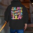 In My Glowing Teacher Era Teaching Back To School Men Zip Up Hoodie Back Print, funny gift In My Glowing Teacher Era Teaching Back To School Men Zip Up Hoodie Back Print, funny gift
