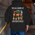 We All Grow At Different Rates Back To School Teacher Men Zip Up Hoodie Back Print, funny gift