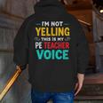 I’m Not Yelling This Is My PE School Teacher Voice I Teach Men Zip Up Hoodie Back Print, Pe Teacher Hoodies, funny gift