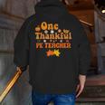 One Thankful PE Teacher Thanksgiving Fall Autumn Groovy Men Zip Up Hoodie Back Print, Pe Teacher Hoodies, Groovy Teacher Hoodies, funny gift One Thankful PE Teacher Thanksgiving Fall Autumn Groovy Men Zip Up Hoodie Back Print, Pe Teacher Hoodies, Groovy Teacher Hoodies, funny gift