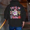 Trick Or Teach Halloween Teacher Floral Ghost Groovy Men Zip Up Hoodie Back Print, Groovy Teacher Hoodies, funny gift