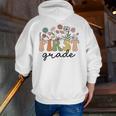 First Grade Teacher Wildflower Back To School Floral Outfits Men Zip Up Hoodie Back Print, First Grade Teacher Hoodies, funny gift First Grade Teacher Wildflower Back To School Floral Outfits Men Zip Up Hoodie Back Print, First Grade Teacher Hoodies, funny gift