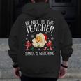 Be Nice To The Teacher Santa Is Watching School Christmas Men Zip Up Hoodie Back Print, funny design Be Nice To The Teacher Santa Is Watching School Christmas Men Zip Up Hoodie Back Print, funny design