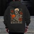 Read In Peace Skeleton Reading Book Halloween Teacher Men Zip Up Hoodie Back Print, funny design Read In Peace Skeleton Reading Book Halloween Teacher Men Zip Up Hoodie Back Print, funny design