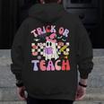 Trick Or Teach Halloween Teacher Floral Ghost Groovy Men Zip Up Hoodie Back Print, Groovy Teacher Gifts, funny design