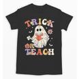 Groovy Halloween Trick Or Teach Retro Floral Ghost Teacher Unisex T-Shirt, Groovy Teacher Gifts, trending gift Groovy Halloween Trick Or Teach Retro Floral Ghost Teacher Unisex T-Shirt, Groovy Teacher Gifts, trending gift