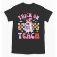 Trick Or Teach Halloween Teacher Floral Ghost Groovy Unisex T-Shirt, Groovy Teacher Gifts, trending gift Trick Or Teach Halloween Teacher Floral Ghost Groovy Unisex T-Shirt, Groovy Teacher Gifts, trending gift