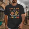 Groovy Fall In Love With Learning Autumn Pumpkin Teacher Unisex T-Shirt, Groovy Teacher Gifts, funny design