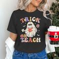 Groovy Halloween Trick Or Teach Retro Floral Ghost Teacher Unisex T-Shirt, Groovy Teacher Shirts, gift for family, gift for coworker Groovy Halloween Trick Or Teach Retro Floral Ghost Teacher Unisex T-Shirt, Groovy Teacher Shirts, gift for family, gift for coworker