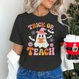 Trick Or Teach Cute Floral Ghost Teacher Halloween Costume Unisex T-Shirt, gift for family, gift for coworker Trick Or Teach Cute Floral Ghost Teacher Halloween Costume Unisex T-Shirt, gift for family, gift for coworker