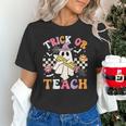 Trick Or Teach Groovy Teacher Halloween Retro Teacher Ghost Unisex T-Shirt, Groovy Teacher Shirts, gift for family, gift for coworker Trick Or Teach Groovy Teacher Halloween Retro Teacher Ghost Unisex T-Shirt, Groovy Teacher Shirts, gift for family, gift for coworker
