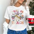 Trick Or Teach Groovy Teacher Halloween Retro Floral Ghost Unisex T-Shirt, Groovy Teacher Shirts, gift for family, gift for coworker Trick Or Teach Groovy Teacher Halloween Retro Floral Ghost Unisex T-Shirt, Groovy Teacher Shirts, gift for family, gift for coworker