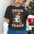 Halloween Teacher Shirts Women School Trick Or Teach Groovy Women's T-Shirt, Groovy Teacher Shirts, gift for family, gift for coworker