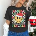 Santas Favorite Teacher Retro Groovy Smile Face Christmas Women's T-Shirt, Groovy Teacher Shirts, gift for family, gift for coworker