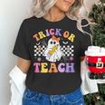 Trick Or Teach Groovy Halloween Teachers Women's T-Shirt, gift for family, gift for coworker Trick Or Teach Groovy Halloween Teachers Women's T-Shirt, gift for family, gift for coworker