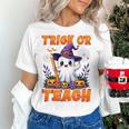 Trick Or Teach Teacher Halloween Ghost Pencil Floral Women's T-Shirt, gift for family, gift for coworker Trick Or Teach Teacher Halloween Ghost Pencil Floral Women's T-Shirt, gift for family, gift for coworker