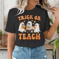 Teacher Halloween Trick Or Teach Retro Groovy Floral Ghost Women's T-Shirt, Groovy Teacher Shirts, funny gift Teacher Halloween Trick Or Teach Retro Groovy Floral Ghost Women's T-Shirt, Groovy Teacher Shirts, funny gift