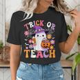Trick Or Teach Groovy Teacher Ghost Halloween Teacher Women's T-Shirt, Groovy Teacher Shirts, funny gift