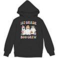 1st Grade Boo Crew Groovy Halloween Floral Ghost Kid Teacher Unisex Hoodie, Groovy Teacher Gifts, trending gift