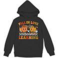 Fall In Love With Learning Autumn Pumpkin Fall Teacher Kids Unisex Hoodie, trending gift Fall In Love With Learning Autumn Pumpkin Fall Teacher Kids Unisex Hoodie, trending gift