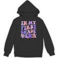 In My First Grade Era 1st Grade Girls Teacher Back To School Unisex Hoodie, First Grade Teacher Gifts, trending gift In My First Grade Era 1st Grade Girls Teacher Back To School Unisex Hoodie, First Grade Teacher Gifts, trending gift