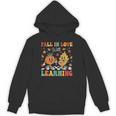 Groovy Fall In Love With Learning Autumn Pumpkin Teacher Unisex Hoodie, Groovy Teacher Gifts, trending gift