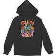 Helping Little Minds Grow Teacher First Day Back To School Unisex Hoodie, trending gift