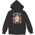 Retro Floral Ghost Trick Or Teach Groovy Teacher Halloween Unisex Hoodie, Groovy Teacher Gifts, trending gift Retro Floral Ghost Trick Or Teach Groovy Teacher Halloween Unisex Hoodie, Groovy Teacher Gifts, trending gift