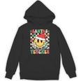 Santas Favorite Teacher Retro Groovy Smile Face Christmas Unisex Hoodie, Groovy Teacher Gifts, trending gift Santas Favorite Teacher Retro Groovy Smile Face Christmas Unisex Hoodie, Groovy Teacher Gifts, trending gift