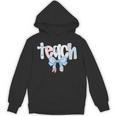 Teach Teacher Coquette Bow Pencil Back To School First Day Unisex Hoodie, trending gift Teach Teacher Coquette Bow Pencil Back To School First Day Unisex Hoodie, trending gift