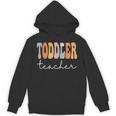 Toddler Teacher Retro Groovy Women Happy First Day Of School Unisex Hoodie, Groovy Teacher Gifts, trending gift Toddler Teacher Retro Groovy Women Happy First Day Of School Unisex Hoodie, Groovy Teacher Gifts, trending gift