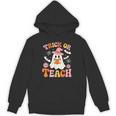 Trick Or Teach Cute Floral Ghost Teacher Halloween Costume Unisex Hoodie, trending gift Trick Or Teach Cute Floral Ghost Teacher Halloween Costume Unisex Hoodie, trending gift