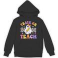 Trick Or Teach Groovy Halloween Teachers Unisex Hoodie, trending gift Trick Or Teach Groovy Halloween Teachers Unisex Hoodie, trending gift