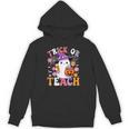 Trick Or Teach Groovy Teacher Ghost Halloween Teacher Unisex Hoodie, Groovy Teacher Gifts, trending gift