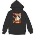 Trick Or Teach Halloween Shirt For Teacher Kids Floral Ghost Unisex Hoodie, trending gift Trick Or Teach Halloween Shirt For Teacher Kids Floral Ghost Unisex Hoodie, trending gift
