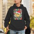 Santas Favorite Teacher Retro Groovy Smile Face Christmas Unisex Hoodie, Groovy Teacher Hoodies, funny gift Santas Favorite Teacher Retro Groovy Smile Face Christmas Unisex Hoodie, Groovy Teacher Hoodies, funny gift