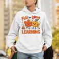 Fall In Love With Learning Thanksgiving Teacher Student Kids Unisex Hoodie, funny gift Fall In Love With Learning Thanksgiving Teacher Student Kids Unisex Hoodie, funny gift