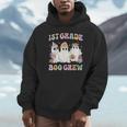 1st Grade Boo Crew Groovy Halloween Floral Ghost Kid Teacher Unisex Hoodie, novelty gifts, funny gifts