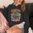 Helping Little Minds Grow Teacher First Day Back To School Unisex Hoodie, funny design