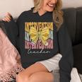 Interventionist Teacher Groovy Coquette Bow Back To School Unisex Hoodie, Groovy Teacher Gifts, funny design Interventionist Teacher Groovy Coquette Bow Back To School Unisex Hoodie, Groovy Teacher Gifts, funny design