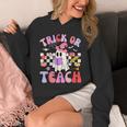 Trick Or Teach Halloween Teacher Floral Ghost Groovy Unisex Hoodie, Groovy Teacher Gifts, funny design