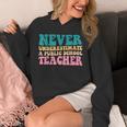 Never Underestimate A Public School Teacher Groovy Women Unisex Hoodie, Groovy Teacher Gifts, funny design Never Underestimate A Public School Teacher Groovy Women Unisex Hoodie, Groovy Teacher Gifts, funny design