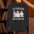 1st Grade Boo Crew Groovy Halloween Floral Ghost Kid Teacher Unisex Hoodie, Groovy Teacher Hoodies, gift for family, gift for coworker