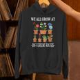 We All Grow At Different Rates Back To School Teacher Unisex Hoodie, gift for family, gift for coworker We All Grow At Different Rates Back To School Teacher Unisex Hoodie, gift for family, gift for coworker