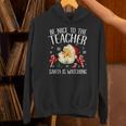Be Nice To The Teacher Santa Is Watching School Christmas Unisex Hoodie, gift for family, gift for coworker