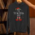The Teacher Elf Christmas Family Matching Group Xmas Unisex Hoodie, gift for family, gift for coworker The Teacher Elf Christmas Family Matching Group Xmas Unisex Hoodie, gift for family, gift for coworker