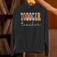 Toddler Teacher Retro Groovy Women Happy First Day Of School Unisex Hoodie, Groovy Teacher Hoodies, gift for family, gift for coworker Toddler Teacher Retro Groovy Women Happy First Day Of School Unisex Hoodie, Groovy Teacher Hoodies, gift for family, gift for coworker