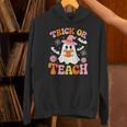 Trick Or Teach Cute Floral Ghost Teacher Halloween Costume Unisex Hoodie, gift for family, gift for coworker Trick Or Teach Cute Floral Ghost Teacher Halloween Costume Unisex Hoodie, gift for family, gift for coworker